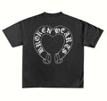Back of a washed black Broken Hearts oversized tee with jumbo white horseshoe heart print in Old English lettering